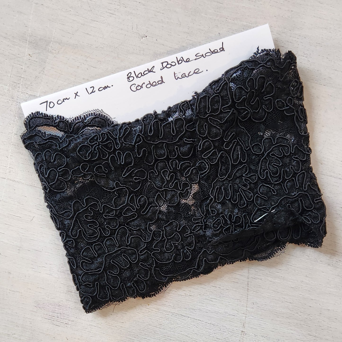 1m Black double sided corded lace