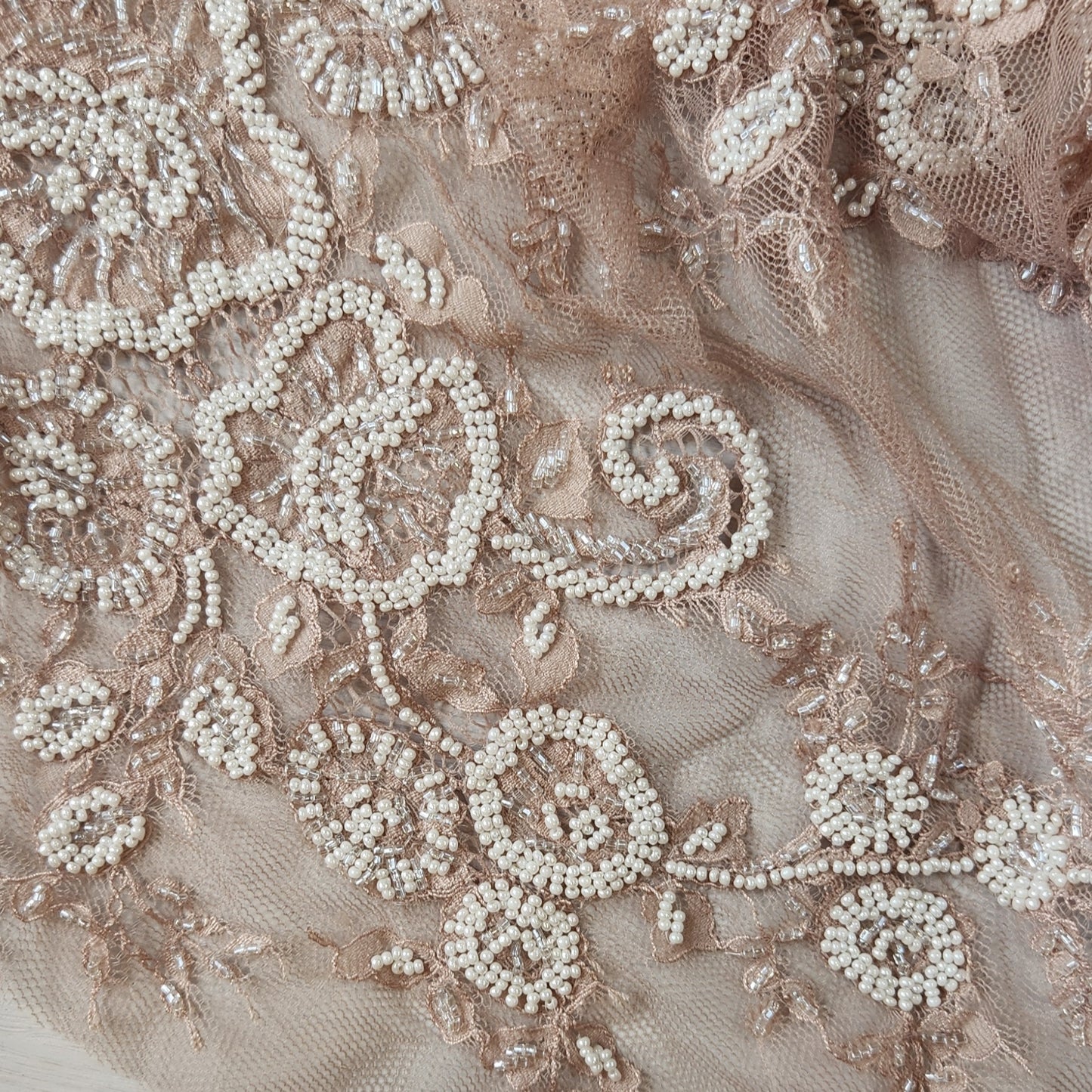 51. Beaded flowers on net