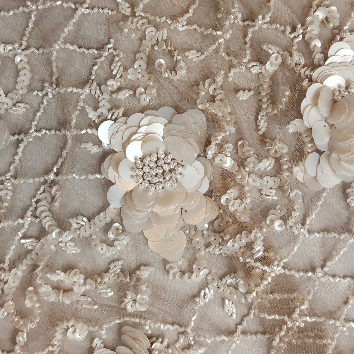 80. Sequin flowers on mesh