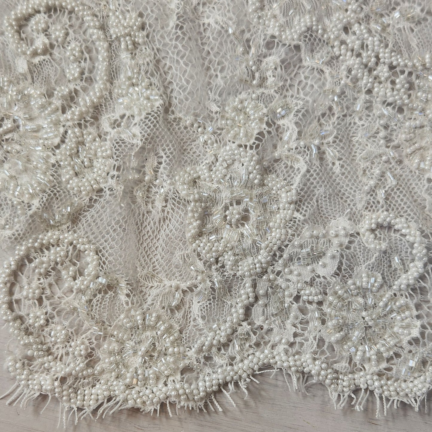 98. Beaded eyelash lace