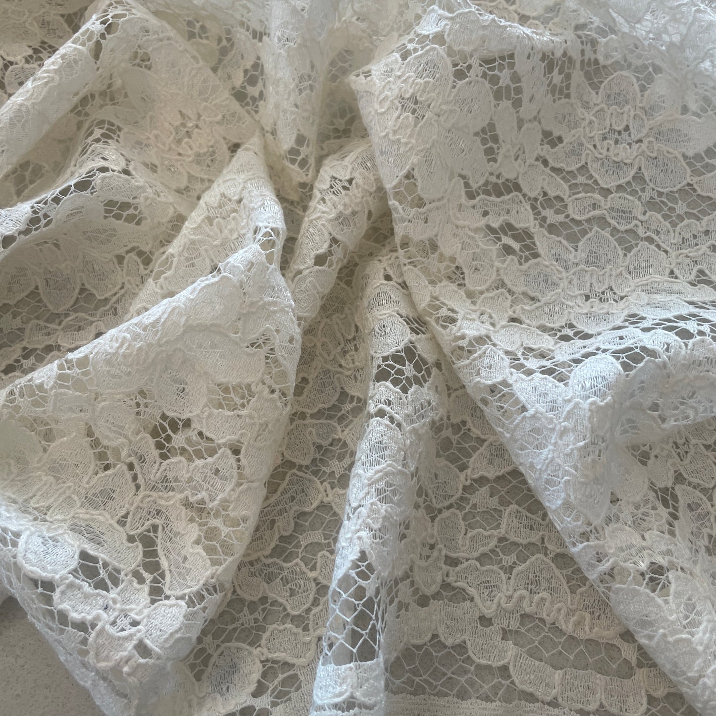 Tilly ivory soft drape corded lace