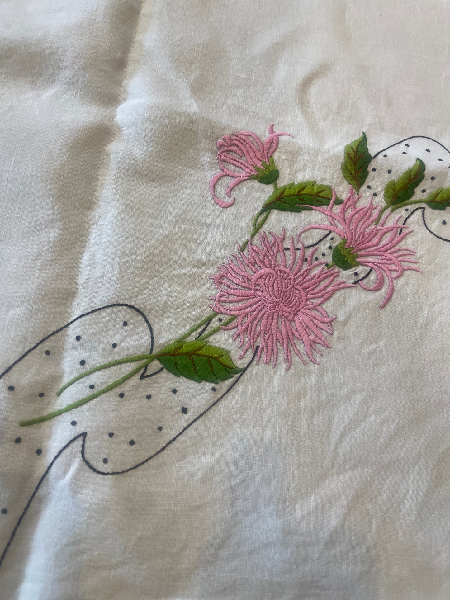 Beautiful embroidered linen cloth with hand crochet border