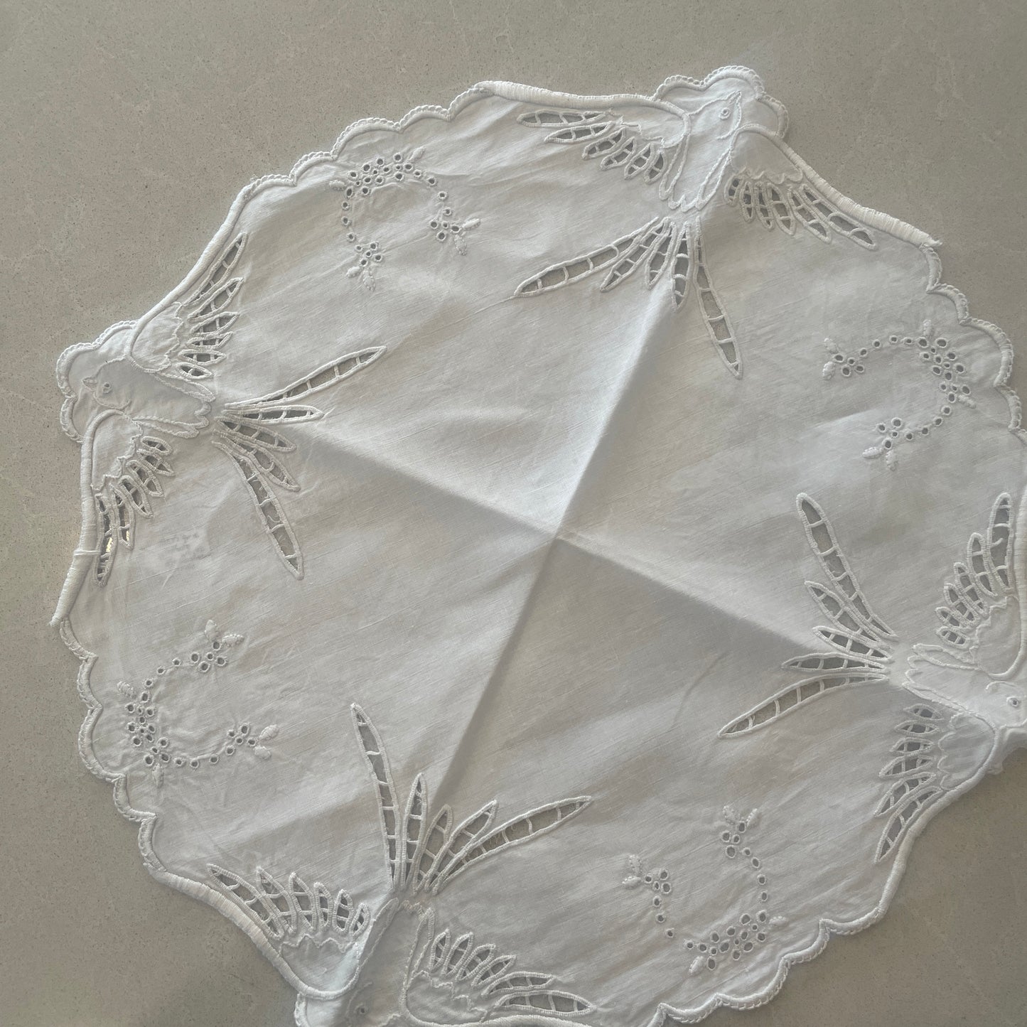 Antique white work embroidered birds table centre