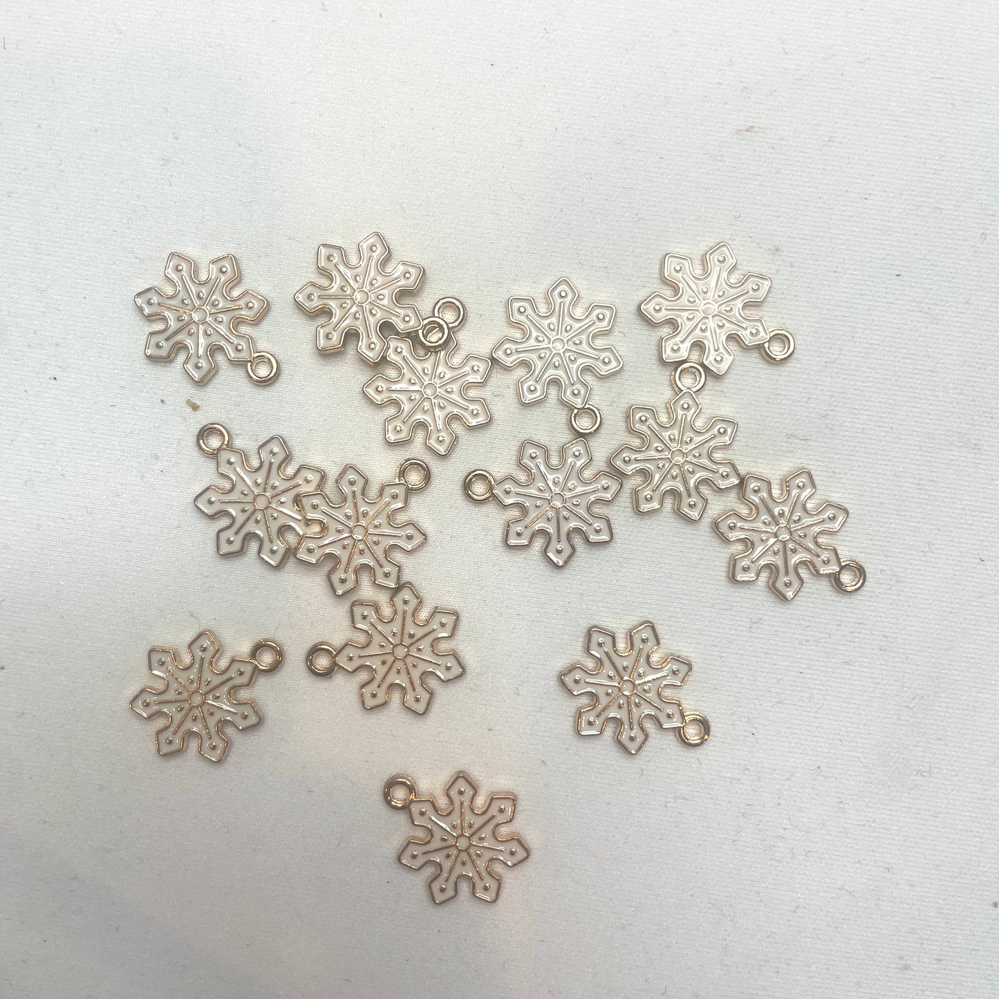 white snowflake charm
