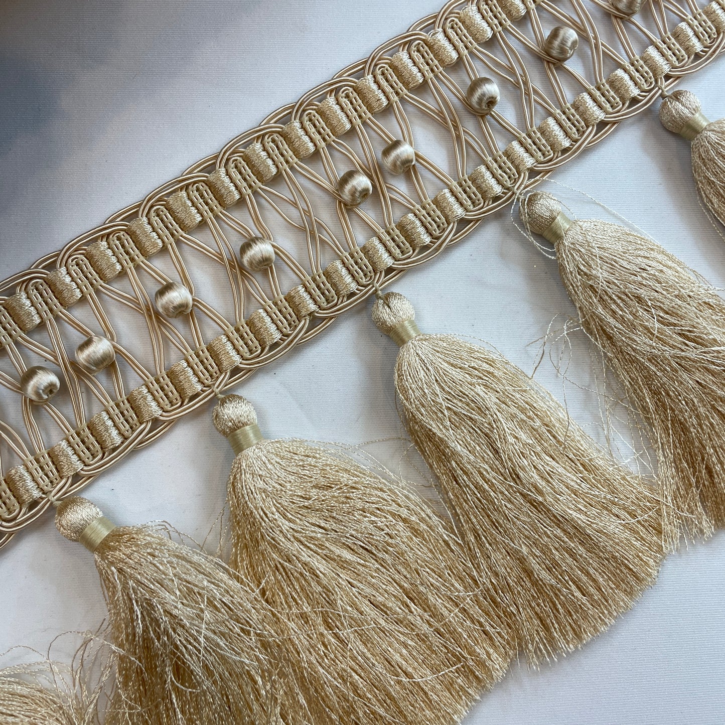 Emilia butter cream baroque tassel braid
