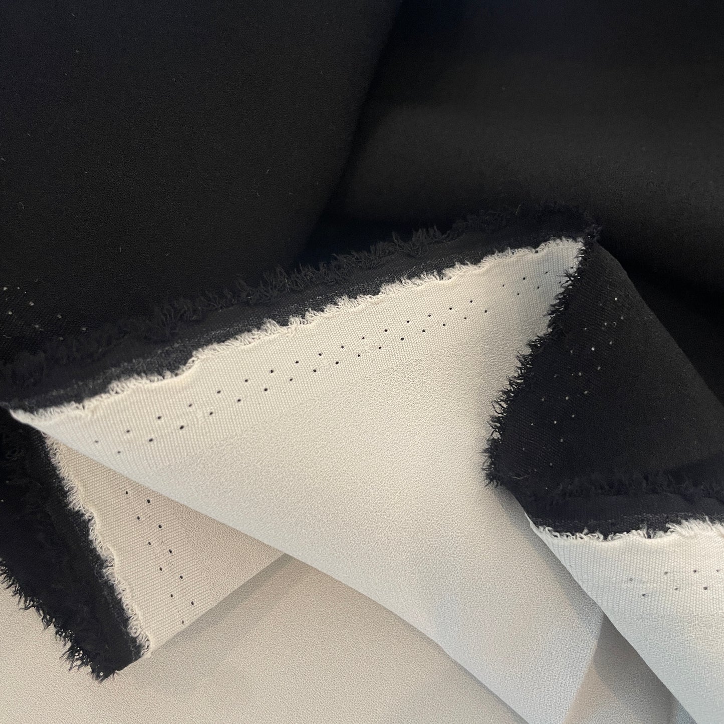 Black white bonded reversible stretch crepe suiting