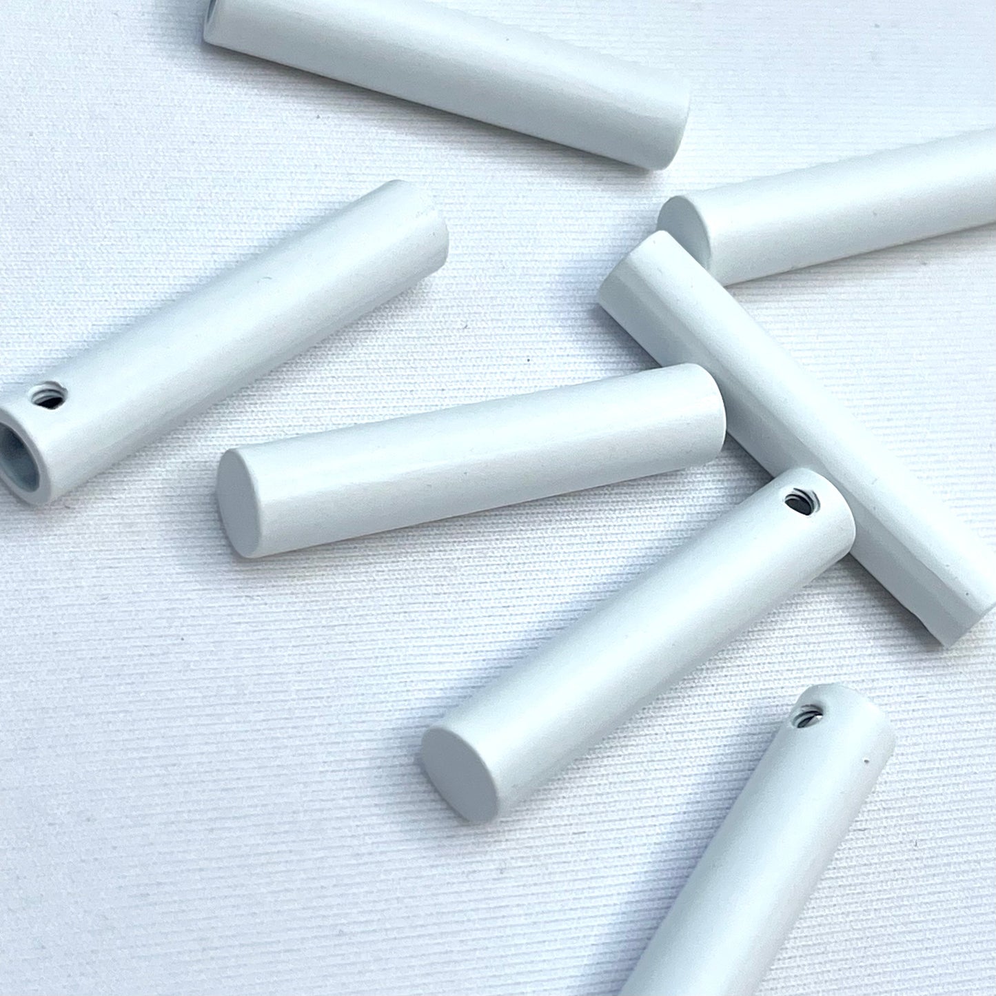 White Metal Tube Toggle Ends