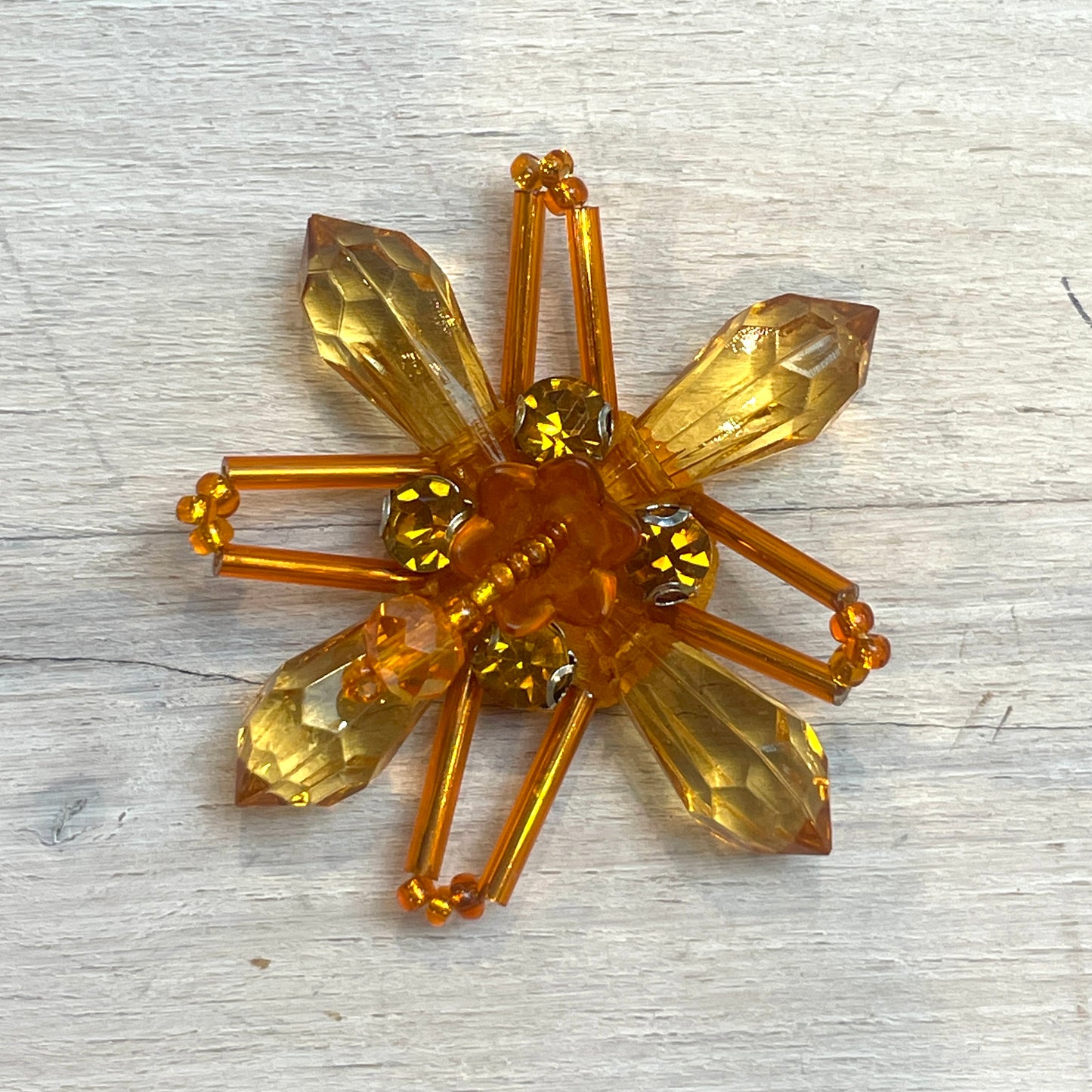 Amber crystal flower motif