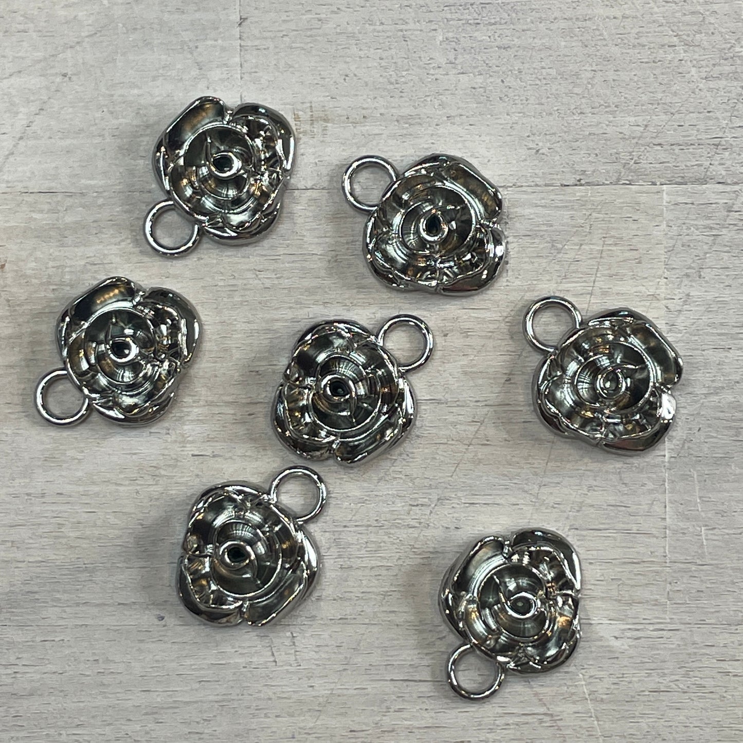 silver flower charm