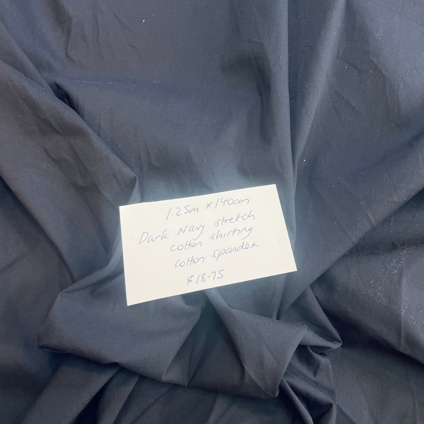 1.25 m dark nsvy stretch cotton shirting