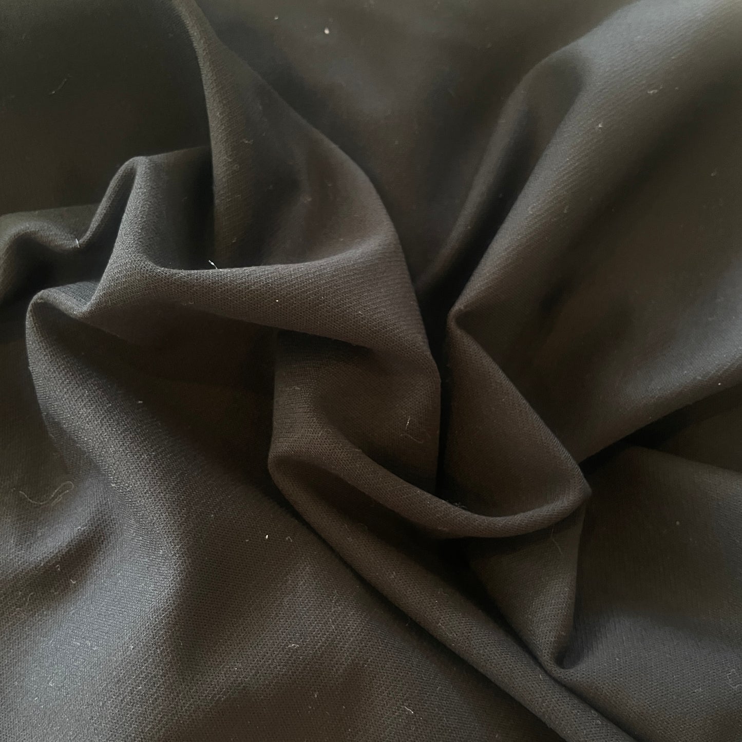 80cm plus end black double knit twill