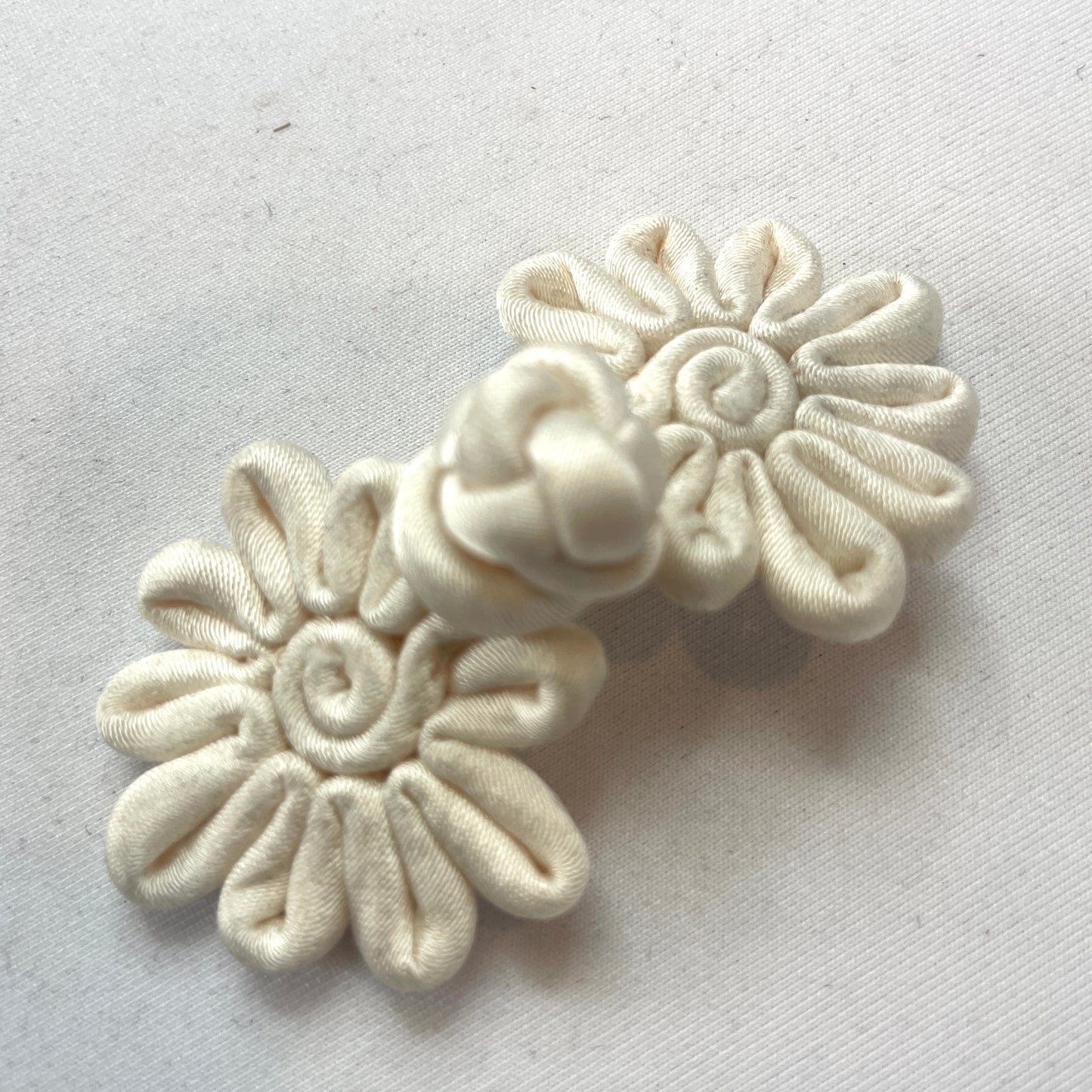 ivory satin frog closure