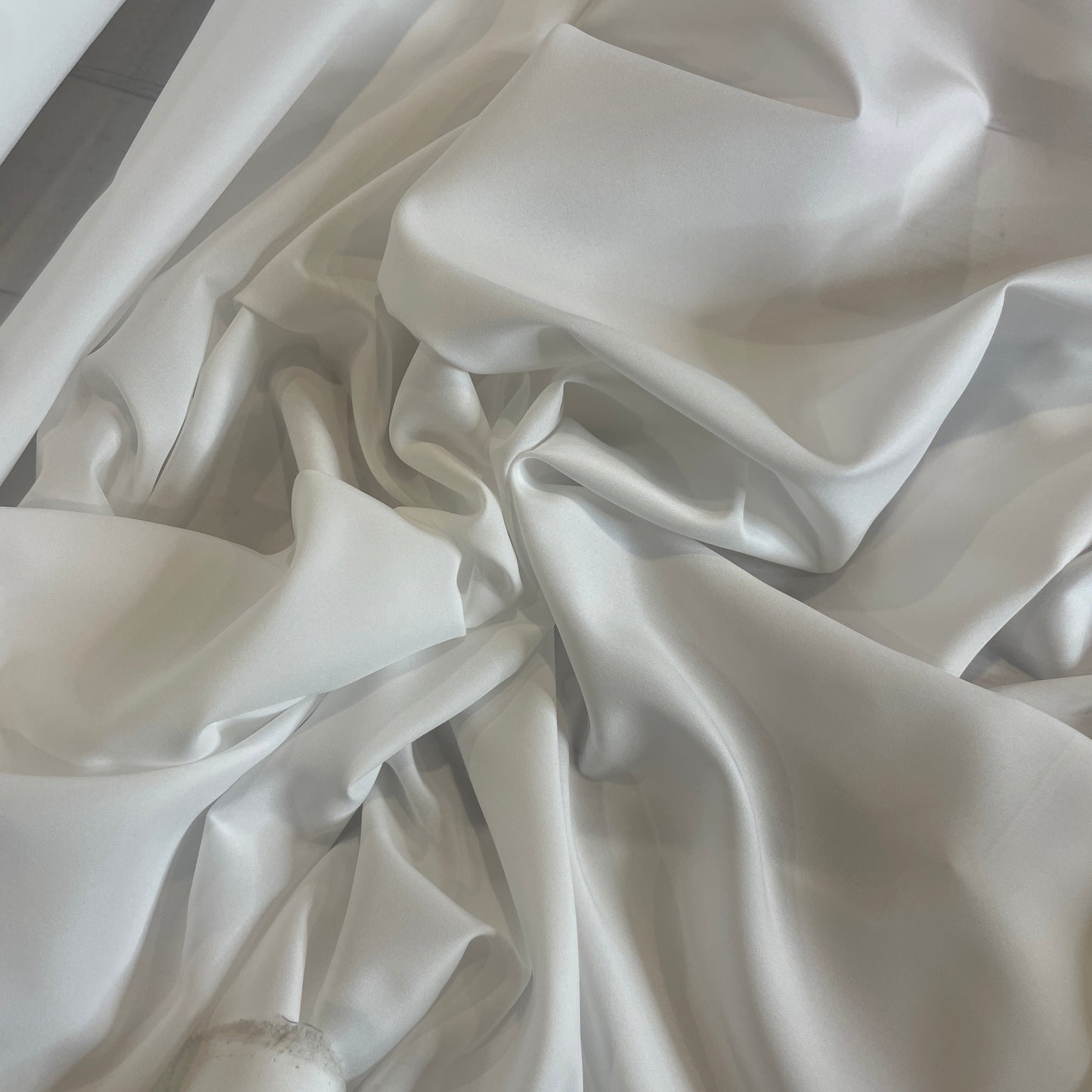 White smooth touch poly voile
