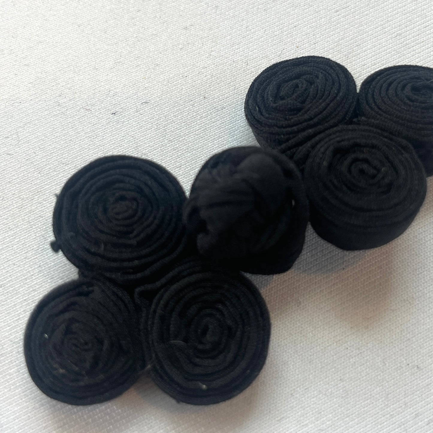 black coiled frog closure