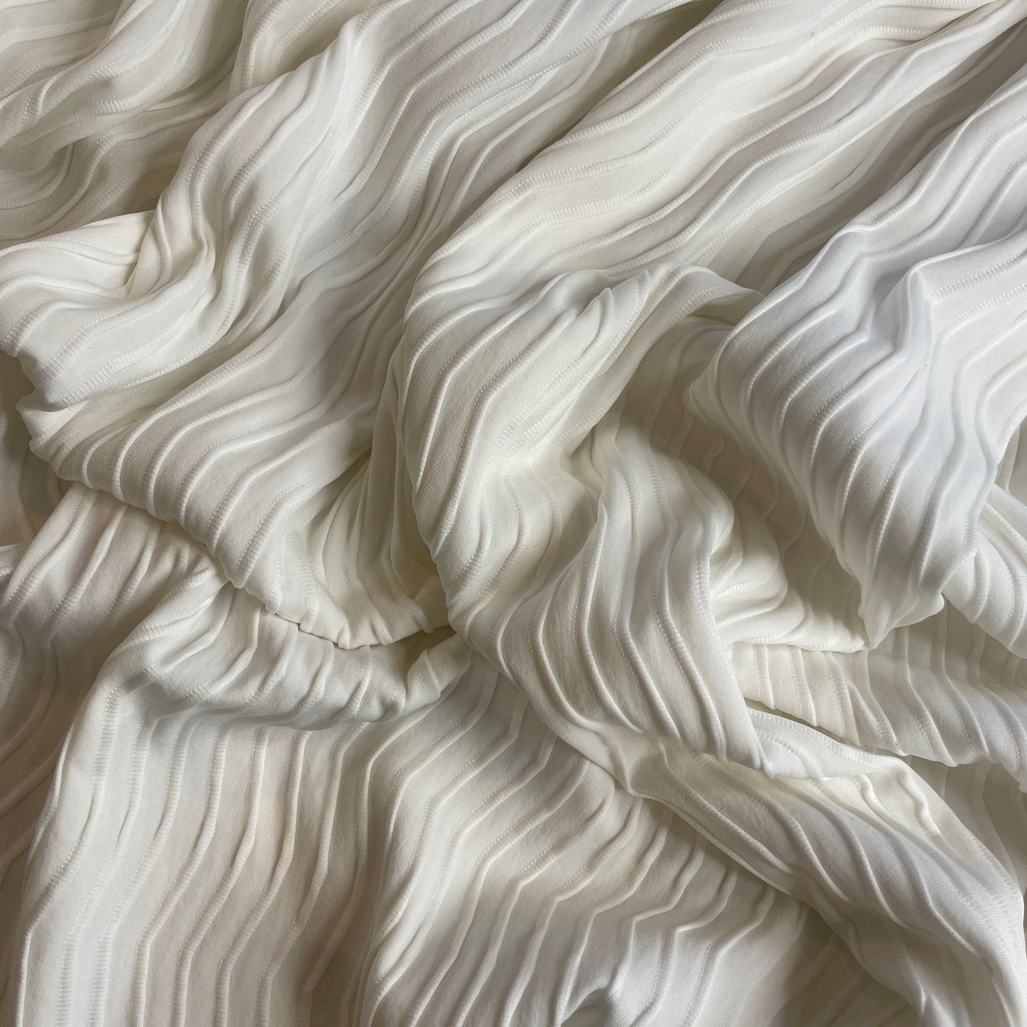 White waves textured jersey