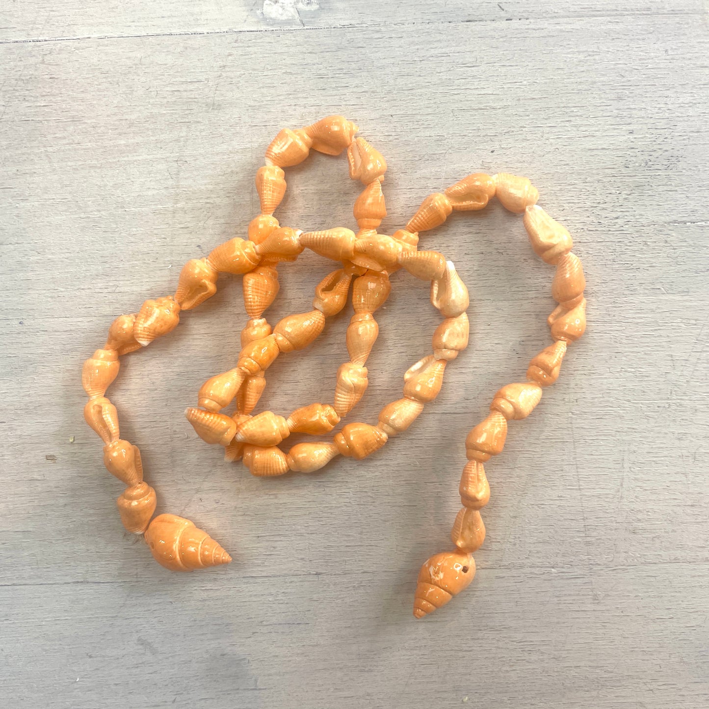 50cm Strand Of Peach Shells.