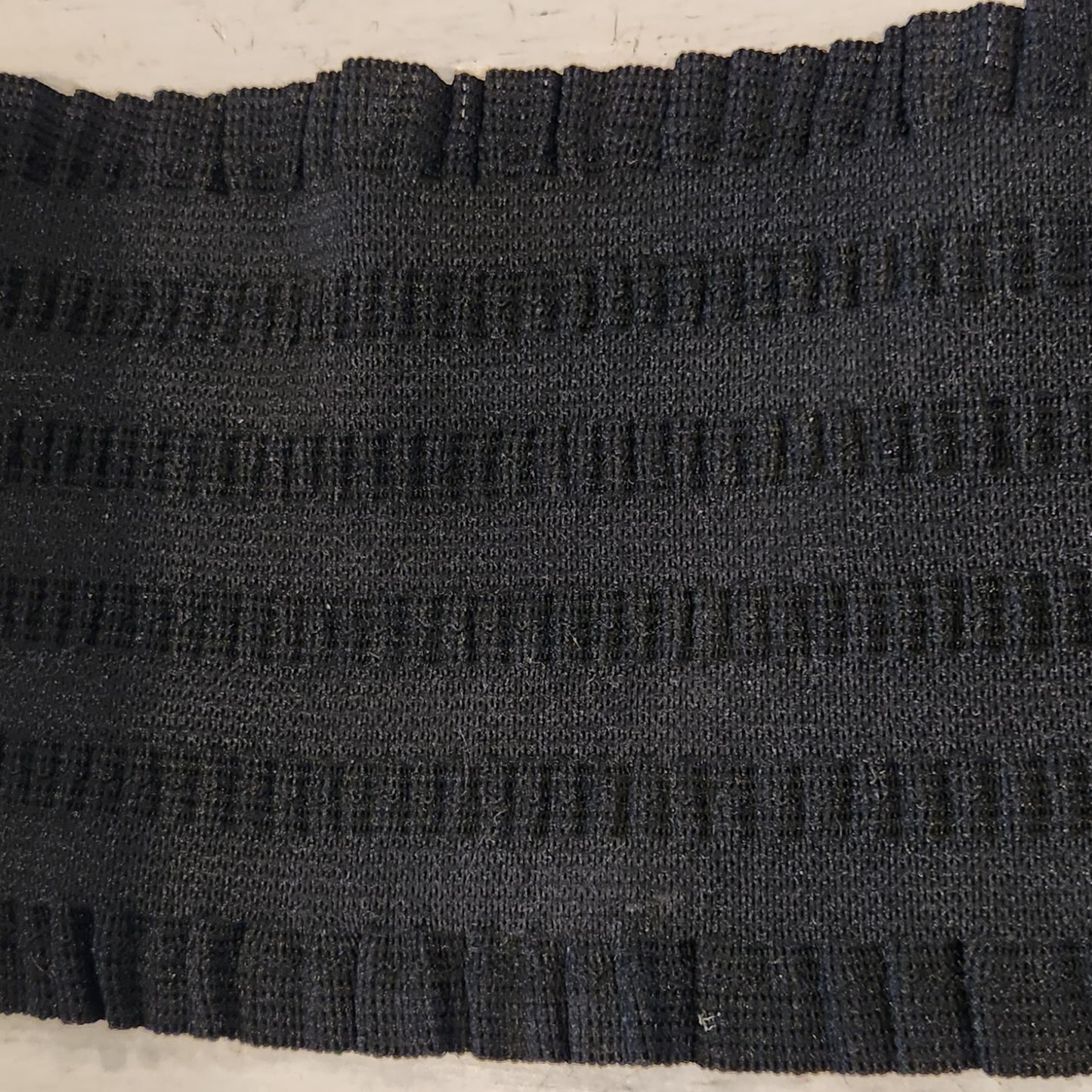 Black decorative frilled edge elastic