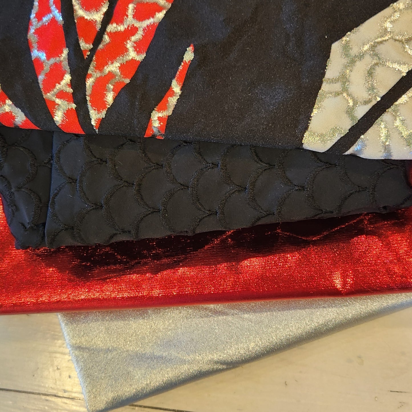 76. 4 pieces assorted lycras and polyester lurex