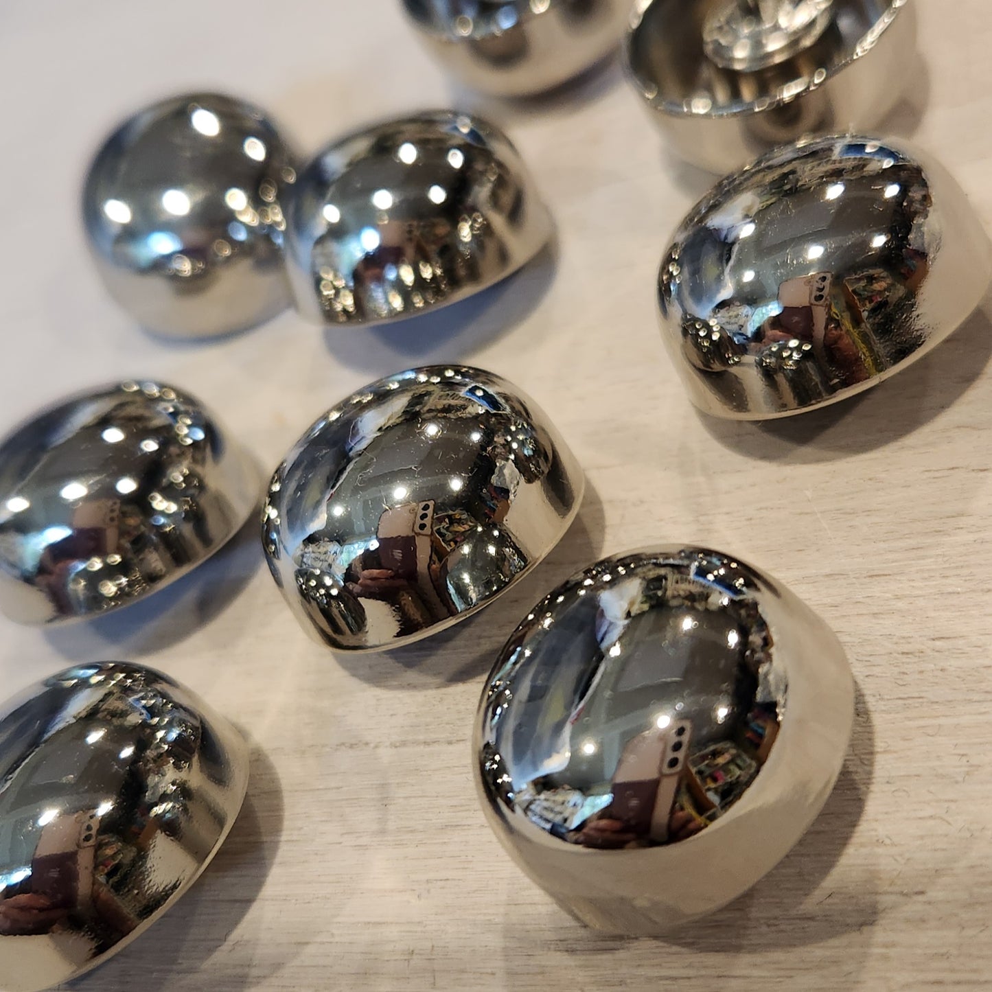 Silver hub button