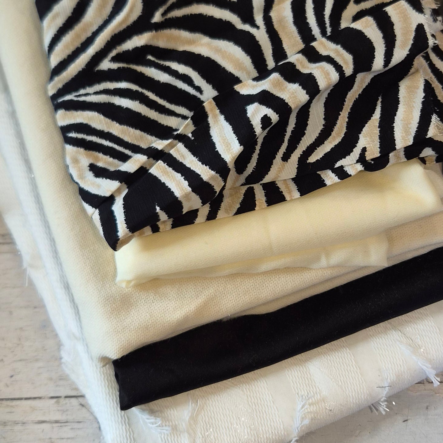 150. 5 pieces assorted fabrics viscose, wool, brocade and fusible interfacing