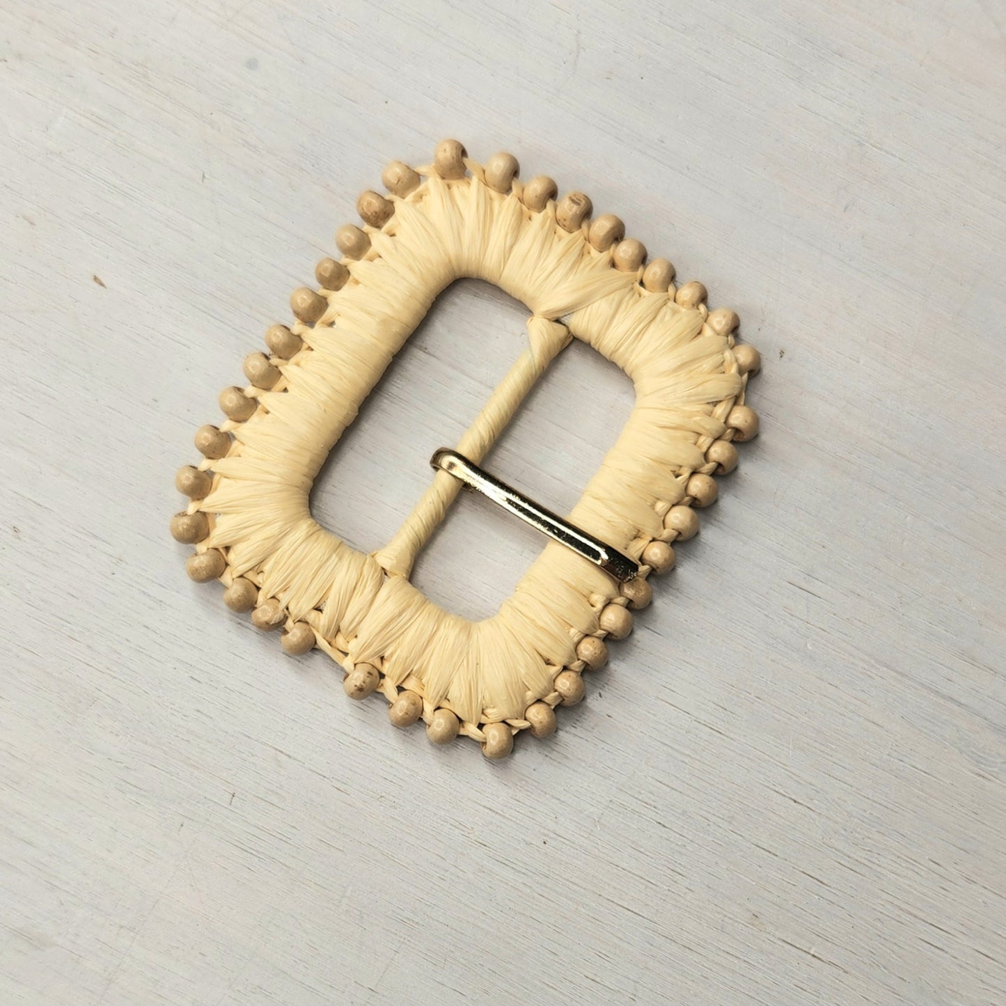 Raffia and bead buckle