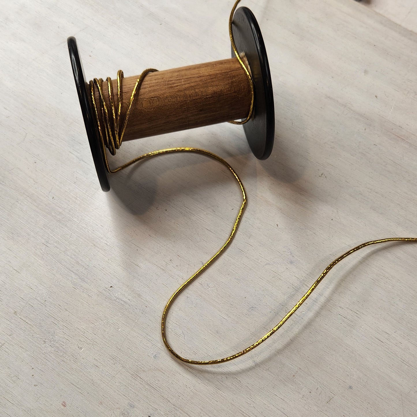 Brilliant gold hat elastic