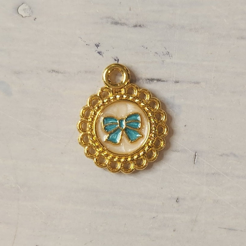 Pretty blue bow heart charm