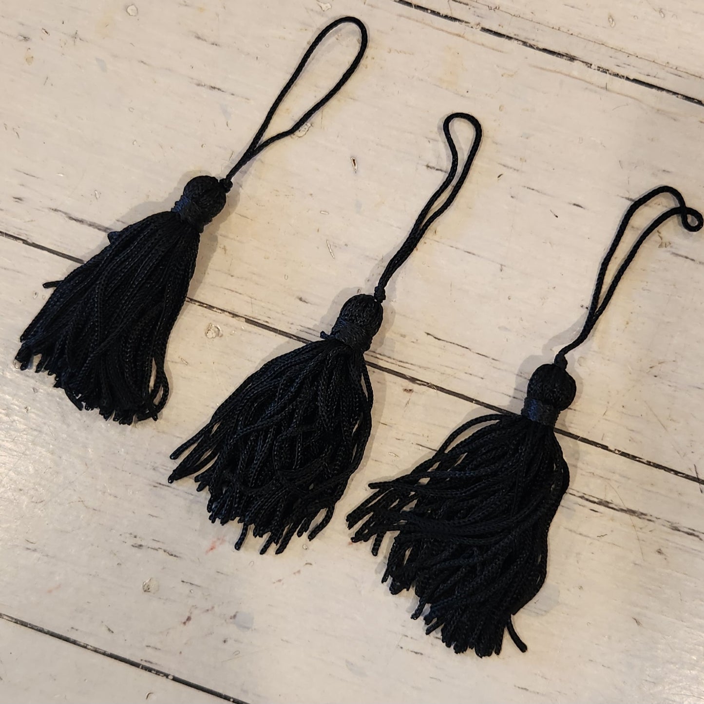 Black silky Tassle