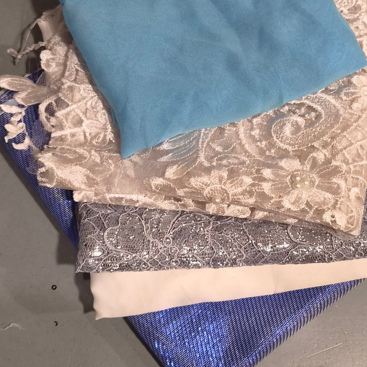 46. 5 pieces assorted lace, brocade, satin andsilk georgette