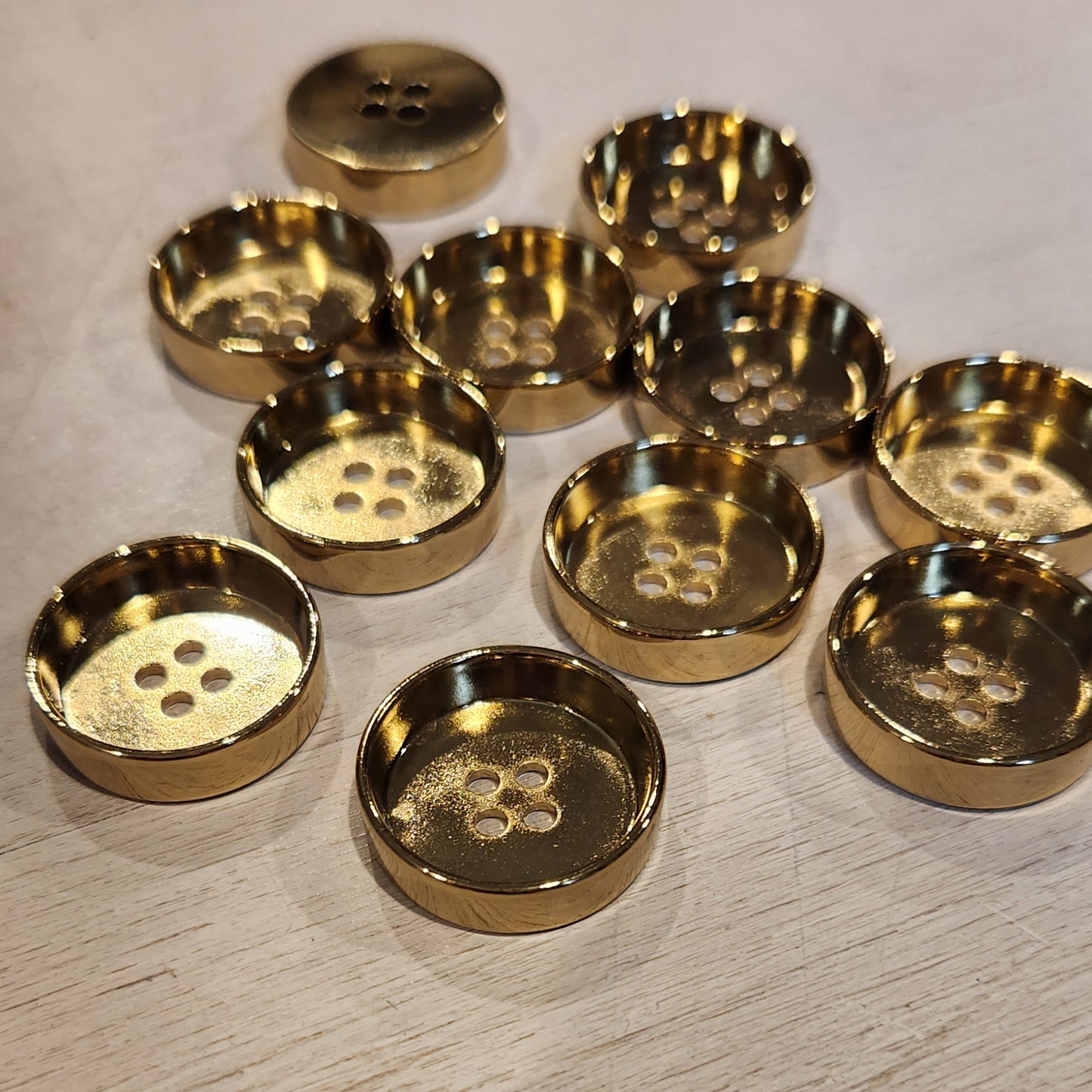 Skyler small gold button