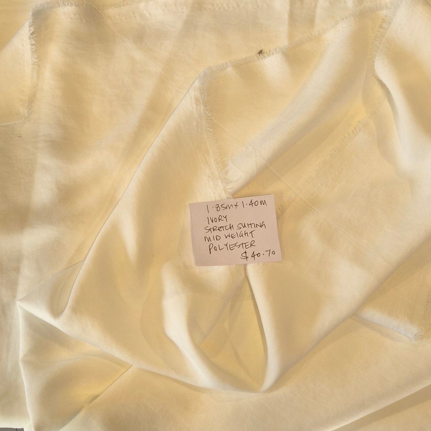 1.85m Ivory stretch suiting