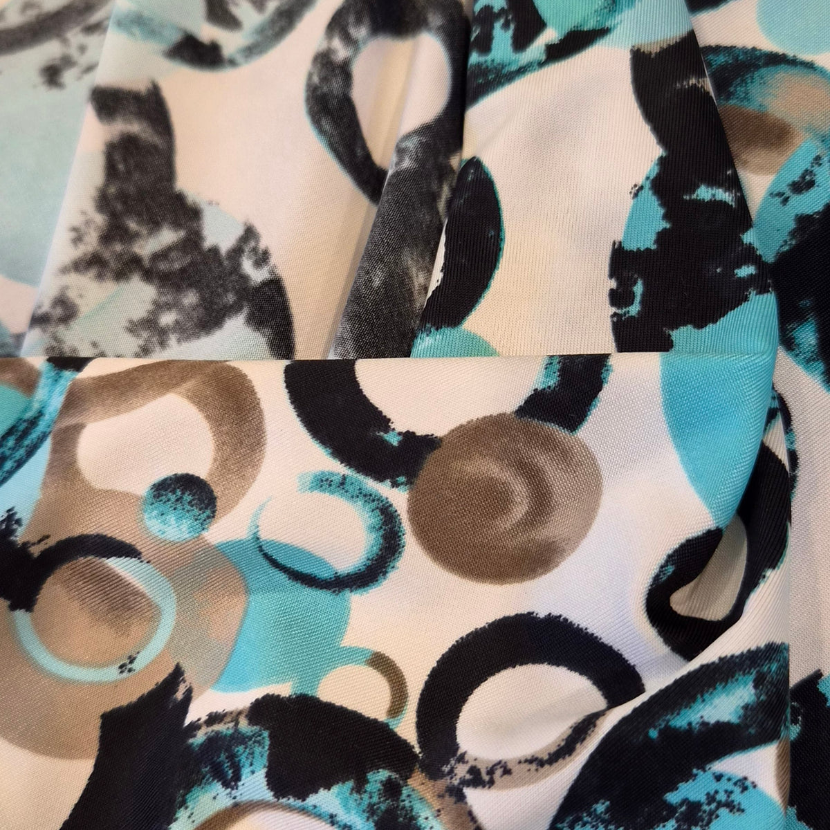 Aqua circles jersey knit