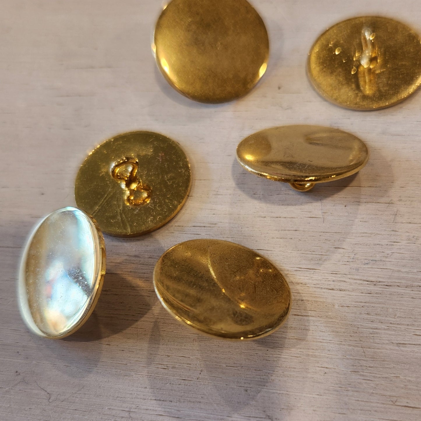 Flat shinny button