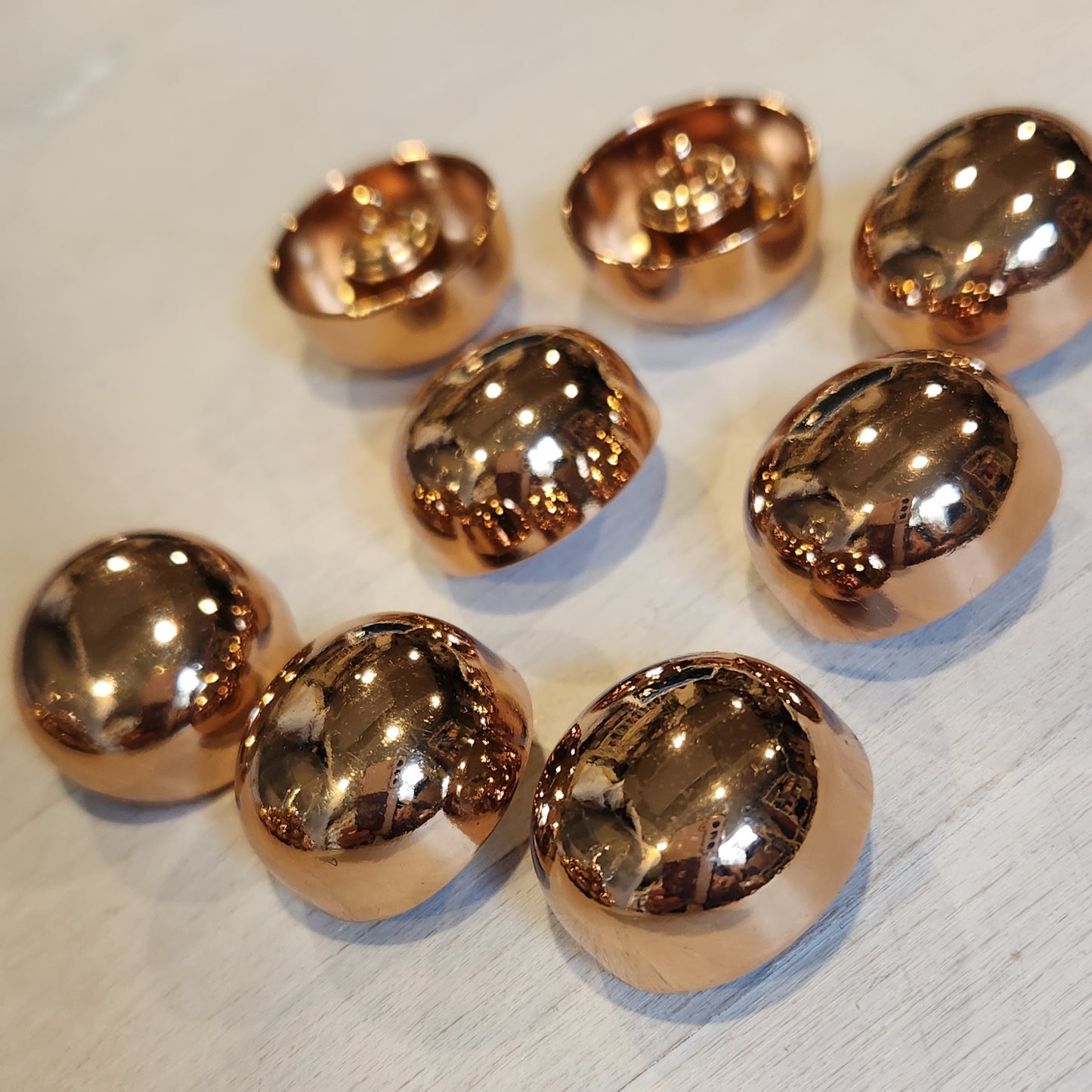 Copper hub button