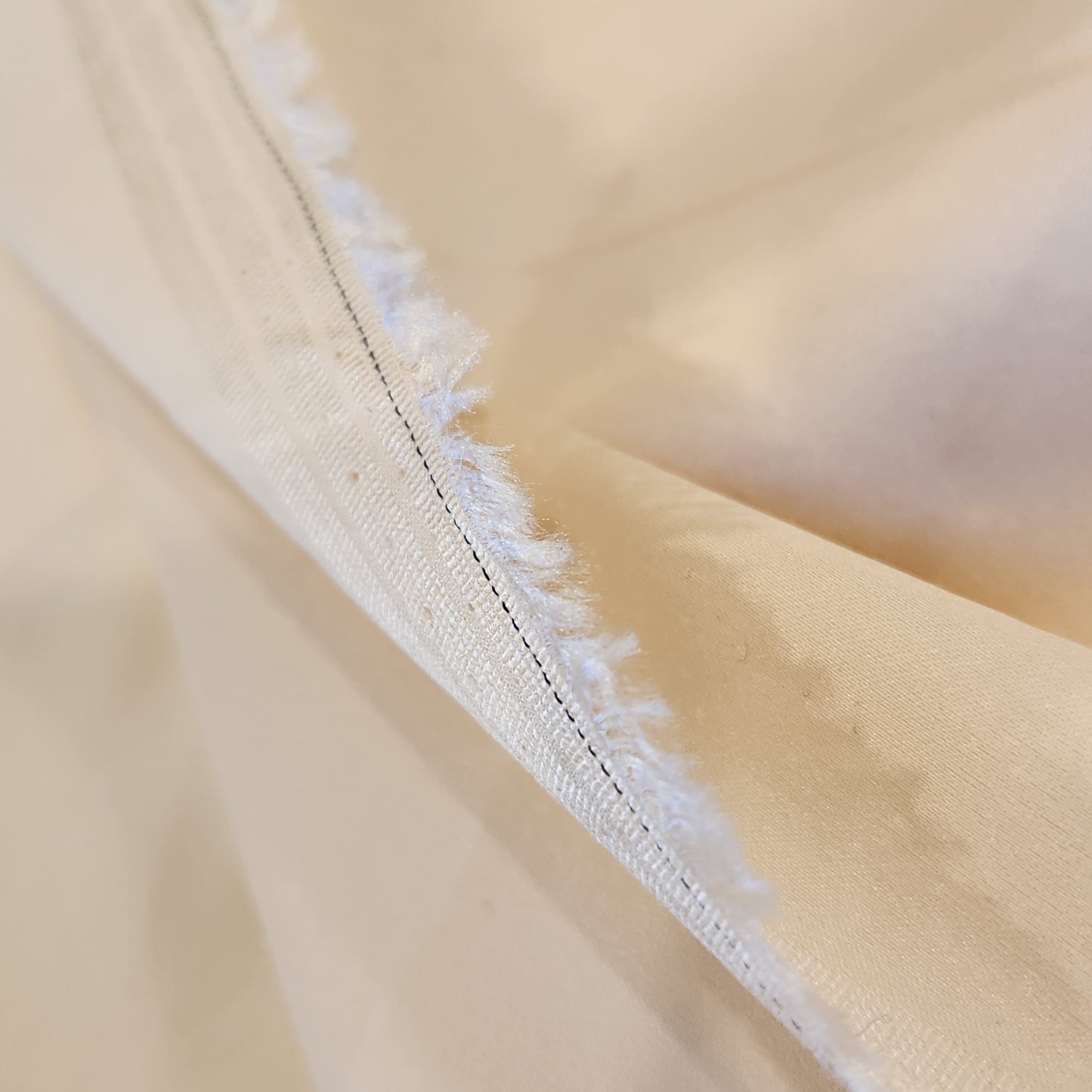 Palest gold stretch satin