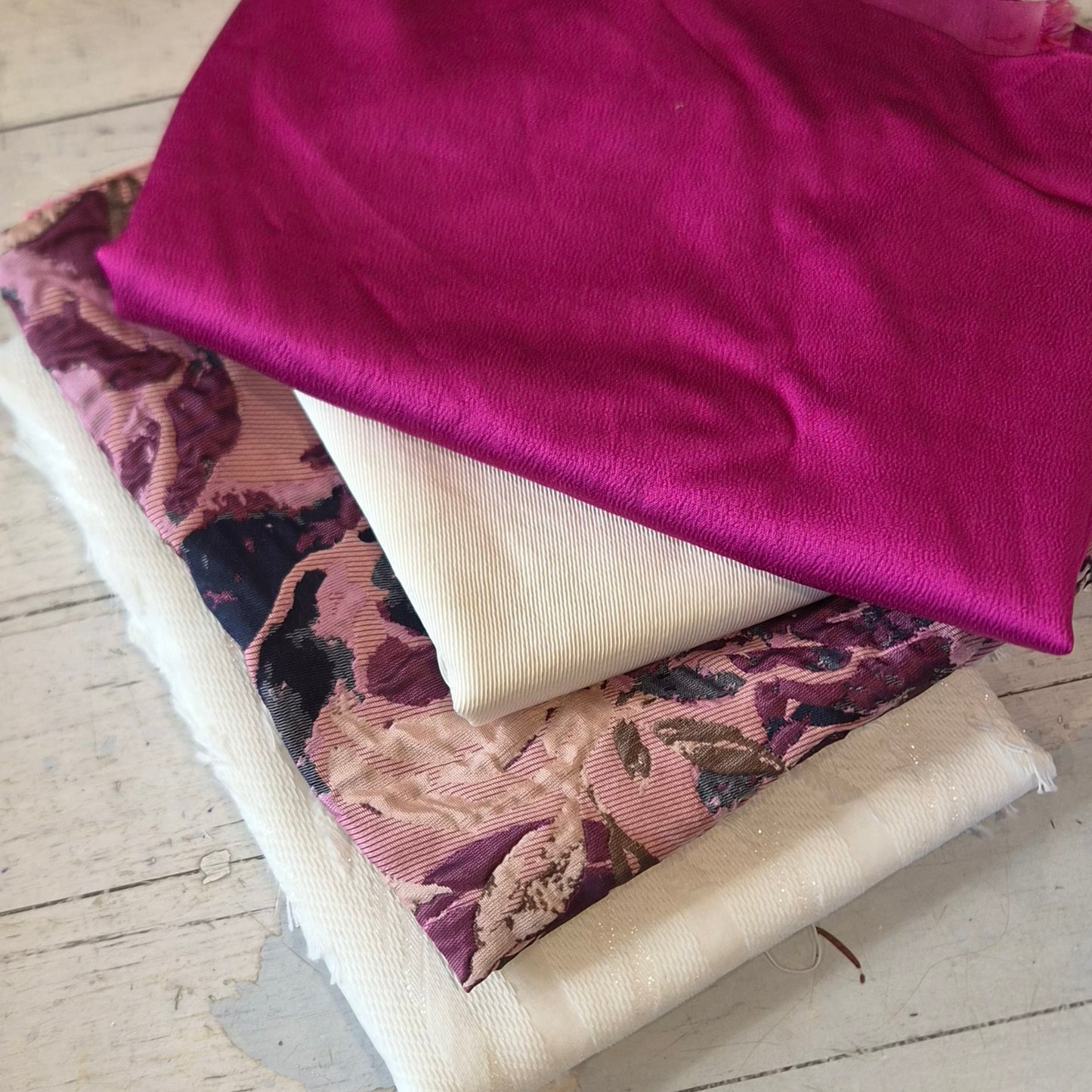 142. 5 pieces assorted fabrics silk twill, viscose satin and brocade