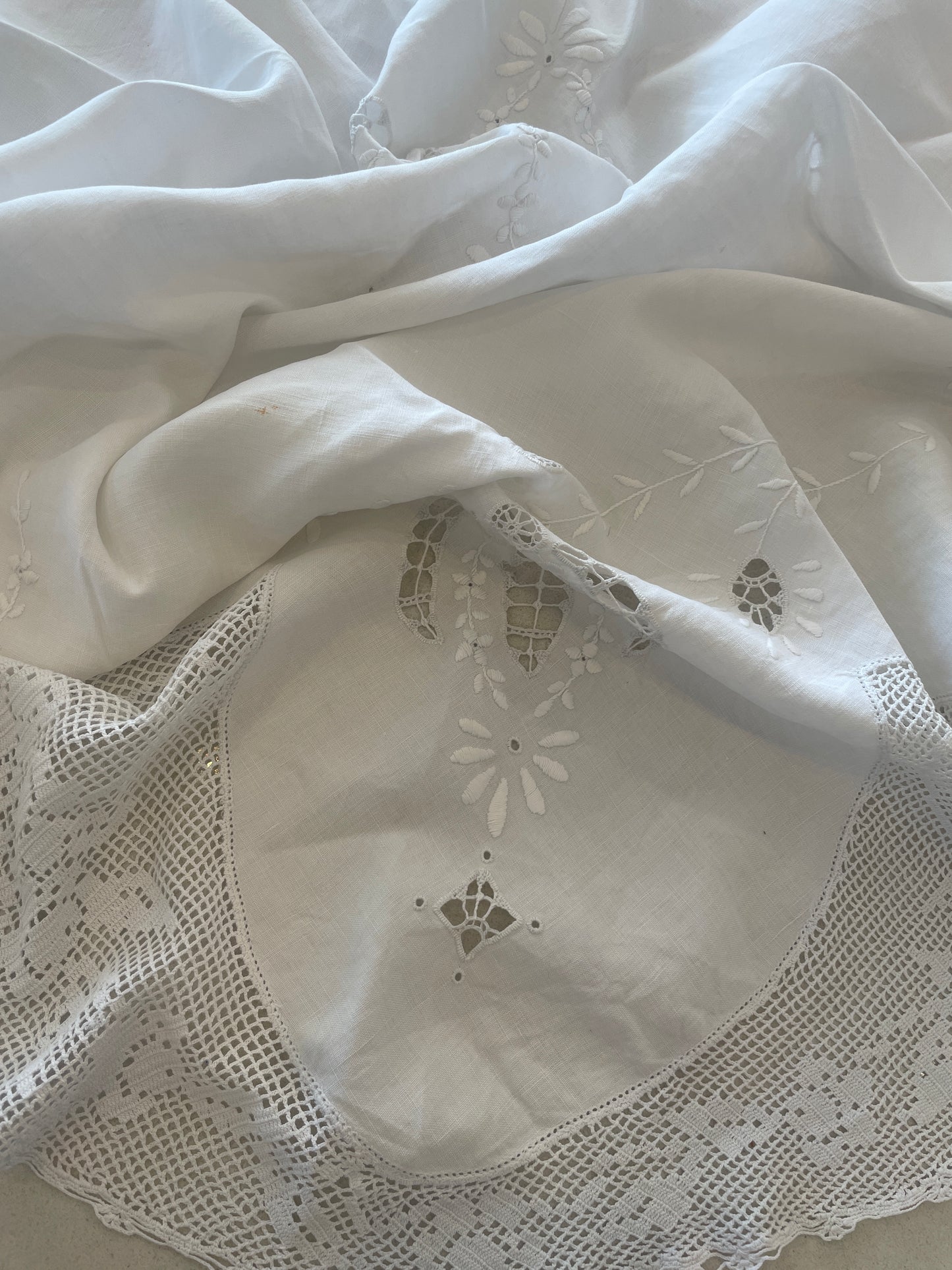 Beautiful antique cut work cloth with crochet edge