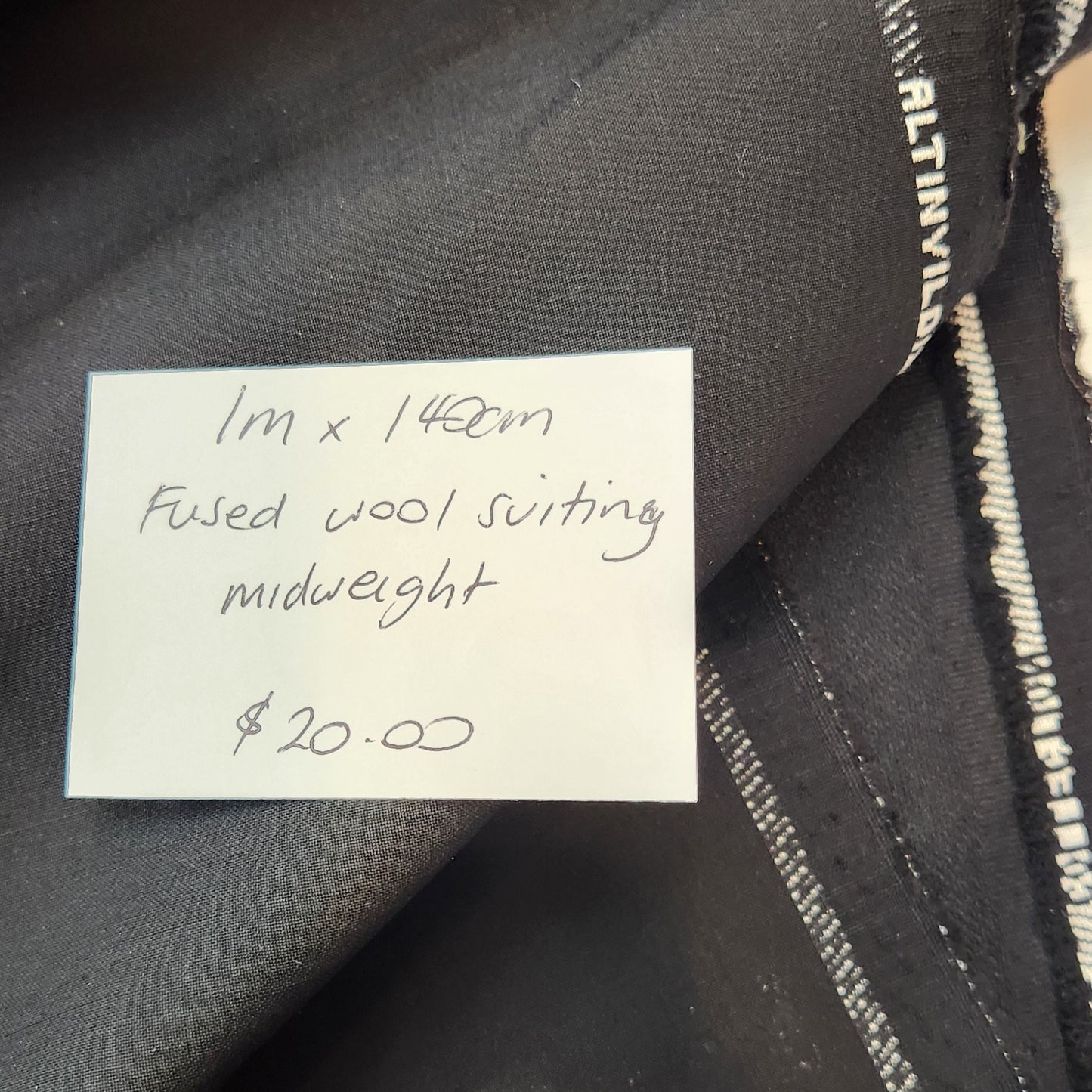 1m Black Fused wool suiting