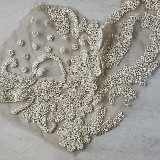 47. Beaded flowers on net
