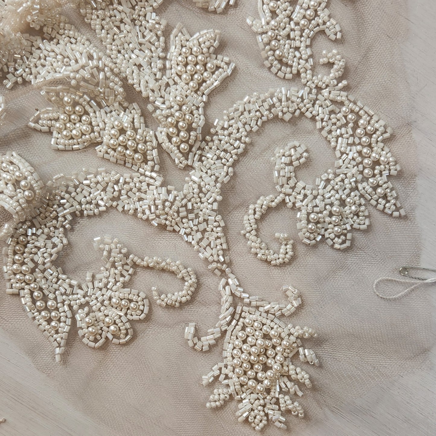 52. Beaded flowers on net