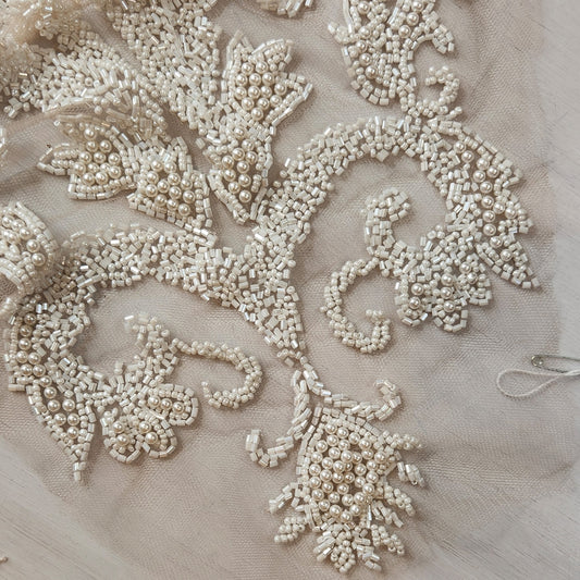 52. Beaded flowers on net