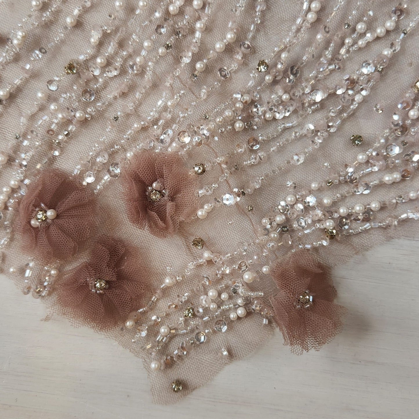 53. Beaded flowers on net