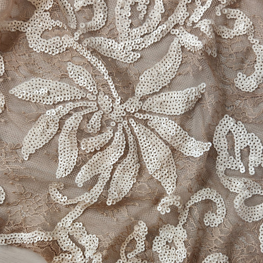 62. Sequin flowers on lace