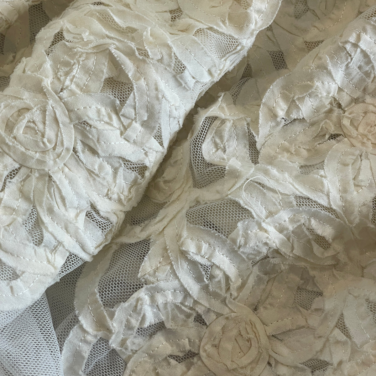 Daisy chain stitched tulle