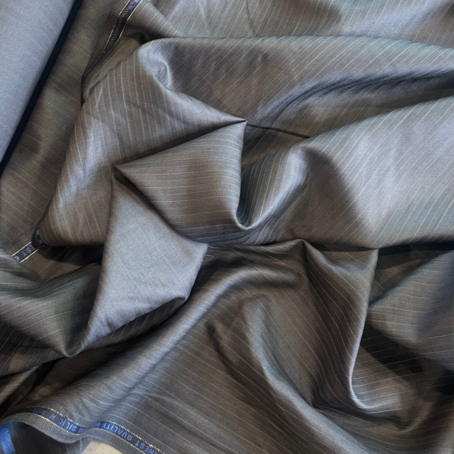 Charcoal pin stripe fine wool suiting