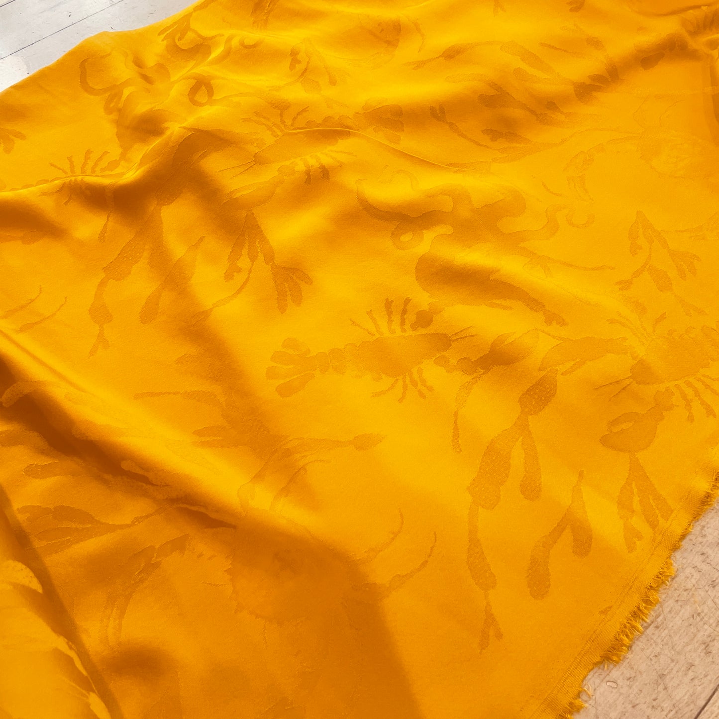 Sea life turmeric jacquard satin