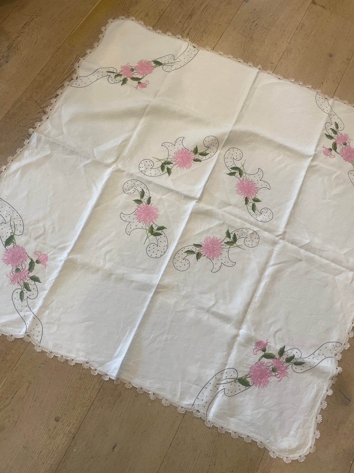 Beautiful embroidered linen cloth with hand crochet border