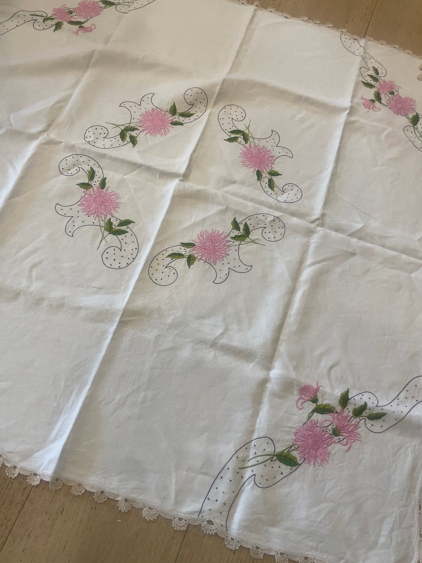 Beautiful embroidered linen cloth with hand crochet border