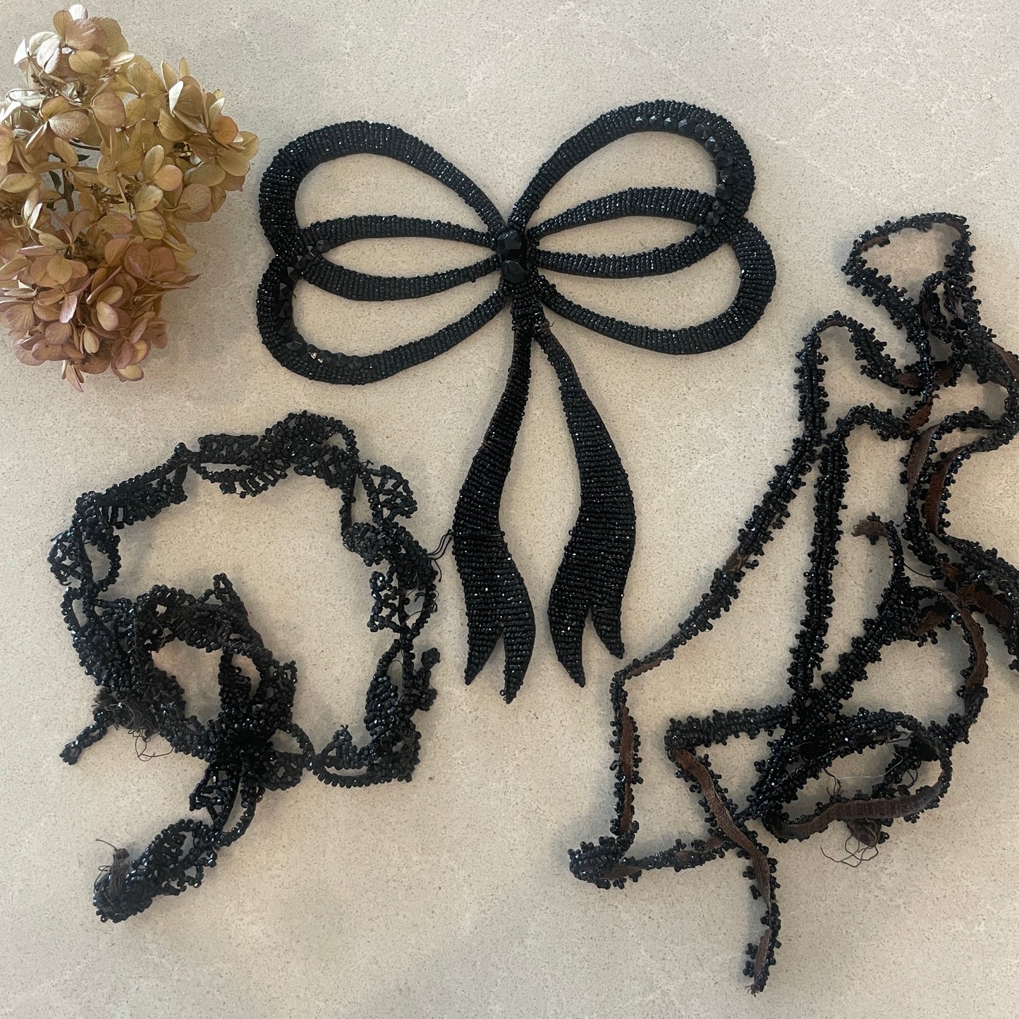 Edwardian jet bead motif and trims salvaged from a dress