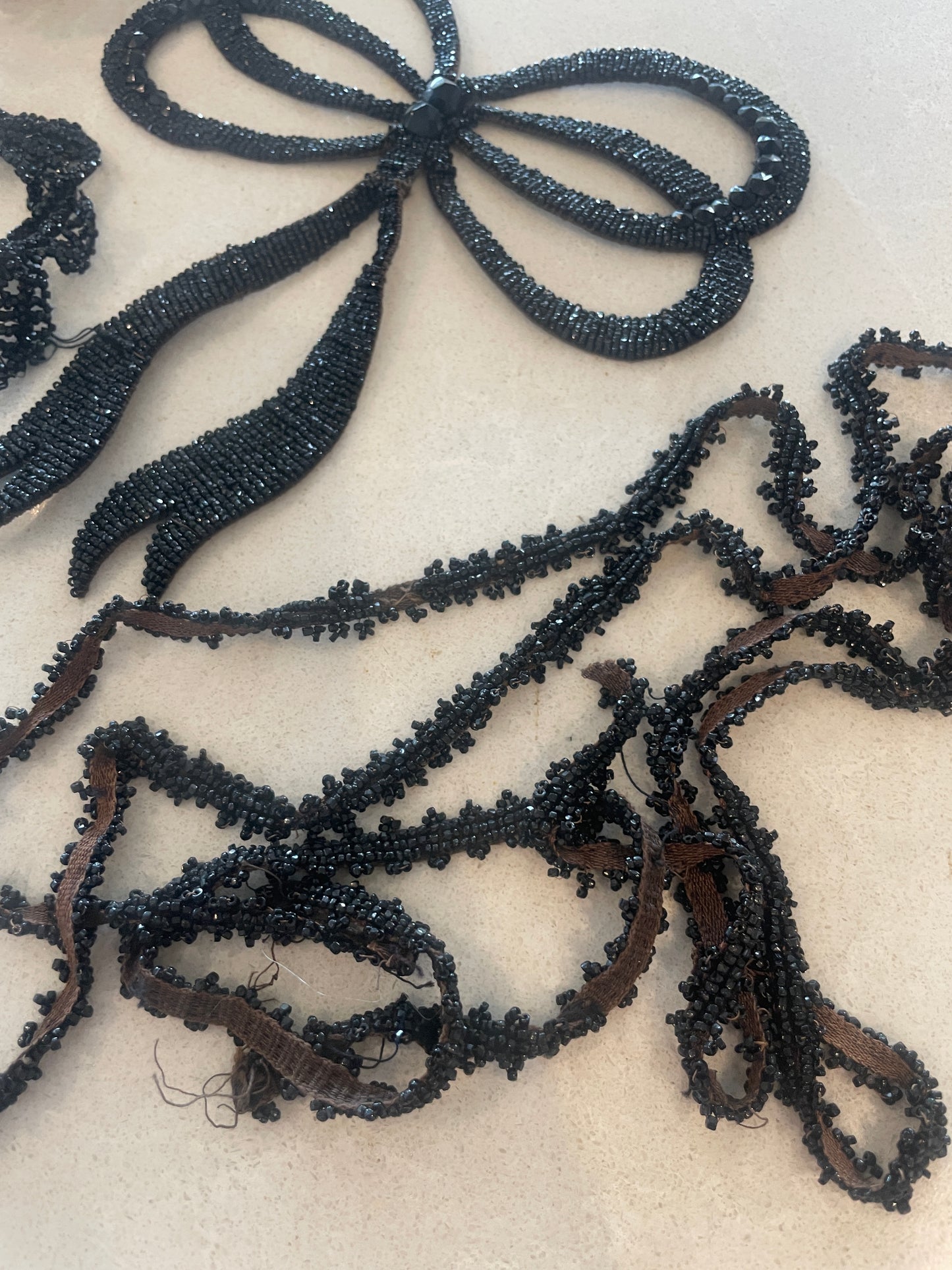 Edwardian jet bead motif and trims salvaged from a dress